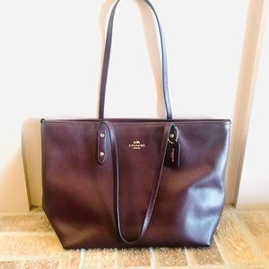 Genuine Coach tote bag. Beautiful, rare rich aubergine color. Great condition!